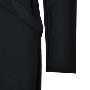 Close-up of sleeve cuffs and fabric texture on a black long sleeve deep V-neck bodysuit