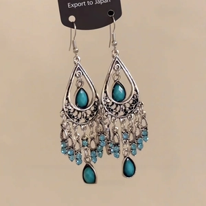 Ethnic bohemian silver drop earrings with turquoise stones and blue tassel fringe