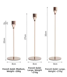 Dreiteiliges Set goldener Eisenleuchter in den Höhen 22cm, 27cm und 32cm für Tischdekoration