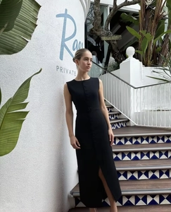 Chic black sleeveless button-down maxi dress with high slit and waist belt detail