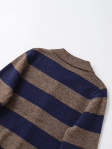 Detail of navy and brown wide-striped polo knitwear showing collar and back texture