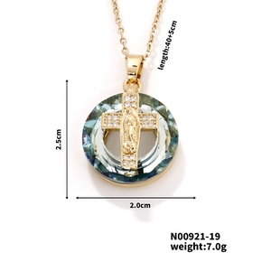 Detail of gold cross pendant with blue crystal and Maria icon on 40+5cm chain