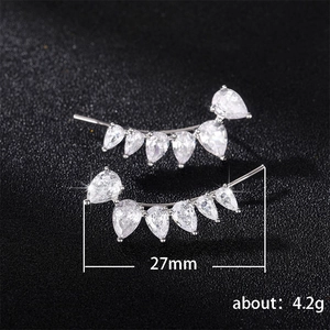Minimalist silver pear-cut zircon ear crawlers with a 27mm curved drop design
