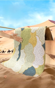 Vue détaillée du paillasson en PVC avec motif de nuages, durable et antidérapant
