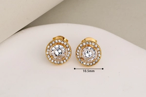 Macro shot of 10.5mm gold-plated round stud earrings with sparkling cubic zirconia stones