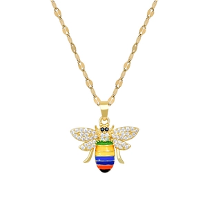 Gold bee necklace with rainbow enamel and faux diamond wings on a polished steel chain