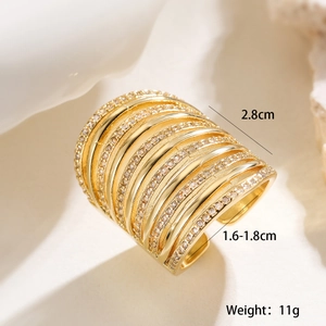 Detailed macro view showing a 2.8cm wide 18K gold plated multi-layer geometric ring
