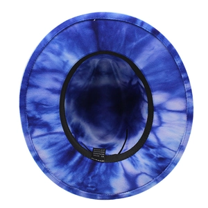 Detail view of tie-dye fedora interior showing the sweatband and material care label