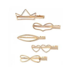 Detail of 5-piece gold metal hair clips in leaf, heart and crown shapes with crystals