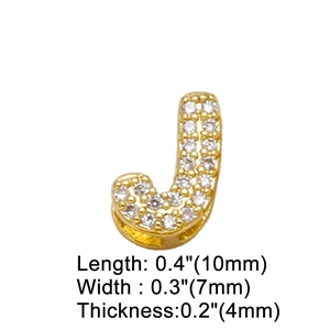 Detailed view of golden letter J pendant with clear zircon inlay and 10x7mm dimensions