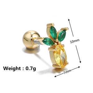 Macro shot of pineapple stud earring with green and yellow cubic zirconia and measurements