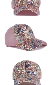 Detailed view of colorful sequin triangle patterns on pink mesh baseball cap