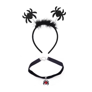 Close-up of black spider feather headband and velvet choker with a red gemstone