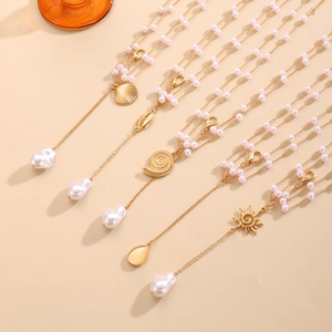 Bohemian multilayer pink pearl body chain set with gold shell and sun pendants