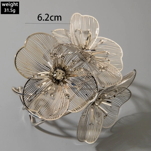Detailed view of silver filigree floral pendant with crystal showing size of 6.2cm