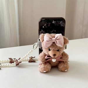Cute brown plush bear phone grip with pink bow and elegant pearl strap charm accessory