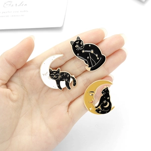Cute black cat enamel pins set featuring moon and star designs in gold-plated zinc alloy