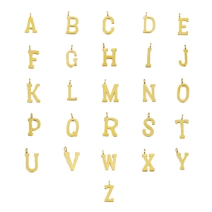 Polished gold stainless steel alphabet A-Z pendants in a neat grid for DIY jewelry