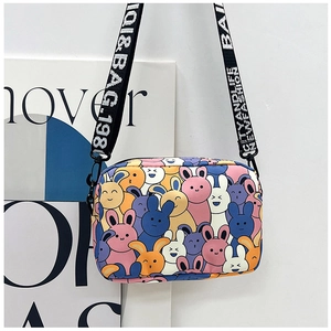Detail of cartoon rabbit print small square bag with branded webbing crossbody strap