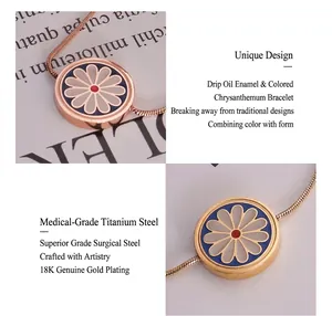Macro detail of enamel daisy charm on 18K gold-plated titanium steel snake chain