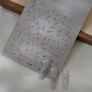 Autocollants ongles 3D pierres précieuses colorées avec contours argentés sur faux ongles