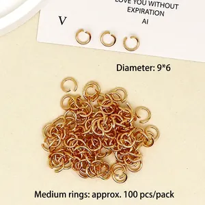 Detailed view of gold-plated jump rings 9x6mm for DIY jewelry making sets