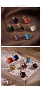 Détail des boucles d'oreilles carrées en œil-de-chat de sept couleurs avec plaqué or
