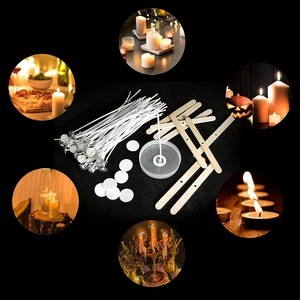 Macro shot of candle DIY kit including cotton wicks, wooden holders, and glue stickers