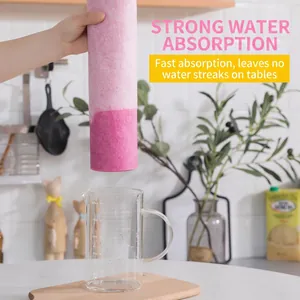 Absorbent pink non-woven kitchen cleaning cloth roll for dishes and countertop