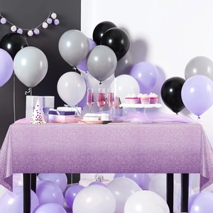 Pink and purple gradient party tablecloth with shiny polka dots for girl birthday decor