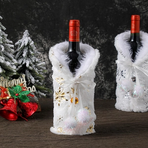 Christmas wine bottle covers with plush white fabric and gold silver snowflake patterns