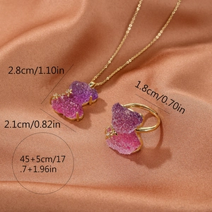 Crystal bear necklace and ring set with purple gradient pendants on champagne silk