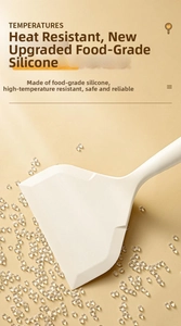 Détail d'une spatule en silicone beige résistant à la chaleur pour tamagoyaki et crêpes