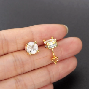 Hip hop gold stud earrings for men featuring round cubic zirconia in a secure four-claw setting