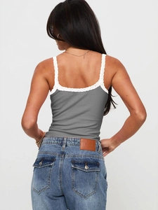 Slim fit knit camisole with white lace trim and ribbed texture shown from the back view