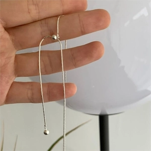 Detailed view of 925 sterling silver ball chain necklace with adjustable slider bead buckle