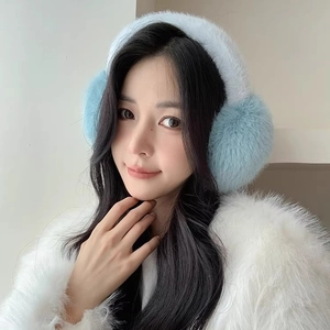 Blue faux rabbit fur earmuffs for winter warmth with plush headband and soft texture
