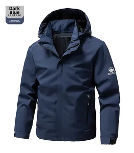 Detail of dark blue waterproof jacket featuring sleeve logo and adjustable velcro cuffs