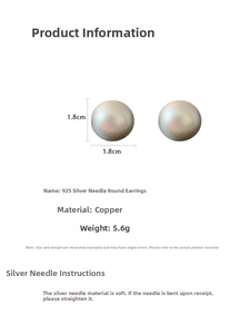 Detailed view of spherical metallic earrings with 925 silver pins and copper base