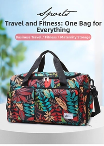 Detail of tropical leaf print travel bag with multiple zip pockets and adjustable strap