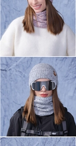 Detail of warm winter knitted beanie and neck warmer set with faux fur lining and ski goggles