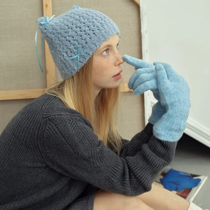 Light blue wool blend knitted beanie and touchscreen gloves set for winter warmth