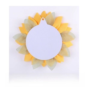 Back view of sunflower wreath showing white mounting base and mesh petal details