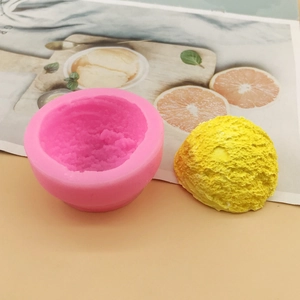 Detail of pink silicone mold with textured semi-sphere ice cream ball model