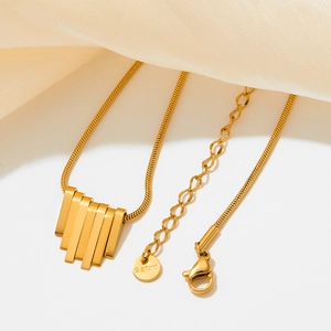 Gold stainless steel fan shaped fringe bar necklace with a dainty snake chain