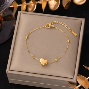 Minimalist gold heart titanium steel bracelet with polished heart pendant and small beads