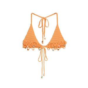 Detail of orange handmade crochet bikini top with bohemian tassels and beaded accents