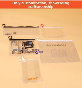 Detailed view of clear PVC zipper bags with colorful ring pulls in various sizes