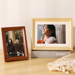 Minimalist wooden picture frames in dark brown and light oak for wall or tabletop display