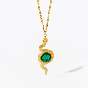Elegant gold snake pendant necklace featuring a central green glass gemstone on white background